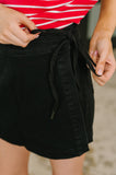 Bentli High Rise Side Tie Denim Skort in Black